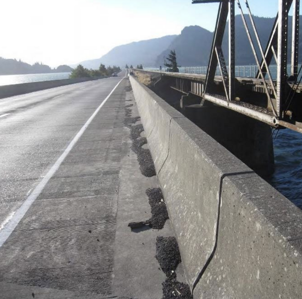 File:NPDES Petition Figure 5- Coal Accumulations on Roadway Bridge over Drano Lake, Adjacent to BNSF Bridge over Same Waterway .png