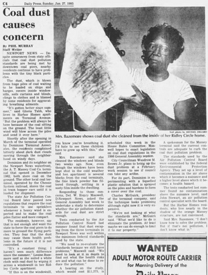 Mrs. Bazemore shows coal dust she cleaned from the inside of her Ridley Circle home in Murry, Coal Dust Causes Concern, Daily Press, January 27, 1985.